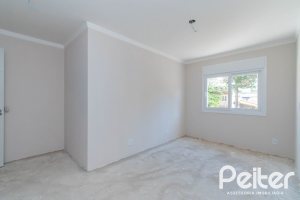 Casa em Condomínio à venda com 293m², 3 dormitórios, 3 suítes, 3 vagas, no bairro Tristeza em Porto Alegre