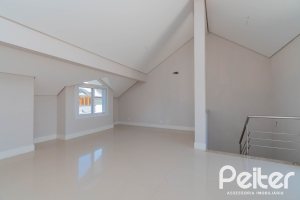 Casa em Condomínio à venda com 293m², 3 dormitórios, 3 suítes, 3 vagas, no bairro Tristeza em Porto Alegre