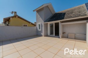 Casa em Condomínio à venda com 293m², 3 dormitórios, 3 suítes, 3 vagas, no bairro Tristeza em Porto Alegre