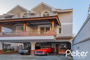 Casa em Condomínio à venda com 293m², 3 dormitórios, 3 suítes, 3 vagas, no bairro Tristeza em Porto Alegre