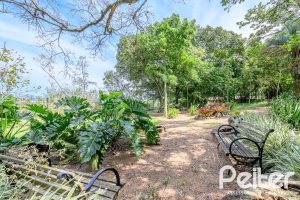 Casa em Condomínio à venda com 293m², 3 dormitórios, 3 suítes, 3 vagas, no bairro Tristeza em Porto Alegre