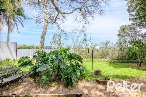 Casa em Condomínio à venda com 293m², 3 dormitórios, 3 suítes, 3 vagas, no bairro Tristeza em Porto Alegre