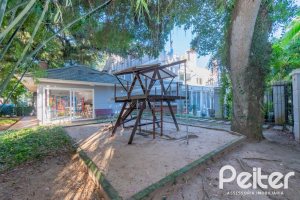 Casa em Condomínio à venda com 293m², 3 dormitórios, 3 suítes, 3 vagas, no bairro Tristeza em Porto Alegre