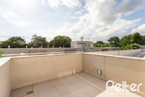Casa em Condomínio à venda com 162m², 4 dormitórios, 2 suítes, 2 vagas, no bairro Vila Nova em PORTO ALEGRE