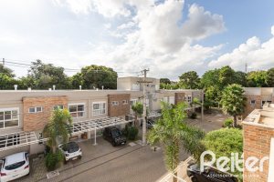 Casa em Condomínio à venda com 162m², 4 dormitórios, 2 suítes, 2 vagas, no bairro Vila Nova em PORTO ALEGRE