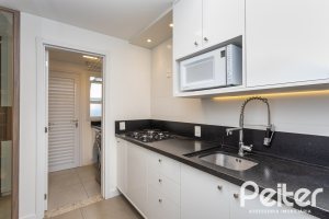 Casa em Condomínio à venda com 162m², 4 dormitórios, 2 suítes, 2 vagas, no bairro Vila Nova em PORTO ALEGRE