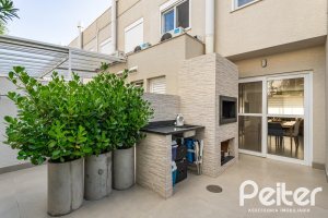 Casa em Condomínio à venda com 162m², 4 dormitórios, 2 suítes, 2 vagas, no bairro Vila Nova em PORTO ALEGRE