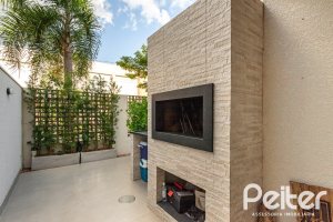 Casa em Condomínio à venda com 162m², 4 dormitórios, 2 suítes, 2 vagas, no bairro Vila Nova em PORTO ALEGRE