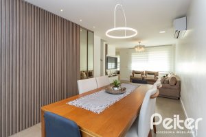 Casa em Condomínio à venda com 162m², 4 dormitórios, 2 suítes, 2 vagas, no bairro Vila Nova em PORTO ALEGRE