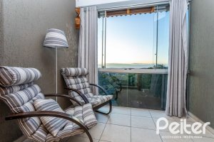 Casa à venda com 262m², 3 dormitórios, 1 suíte, 4 vagas, no bairro Ipanema em Porto Alegre