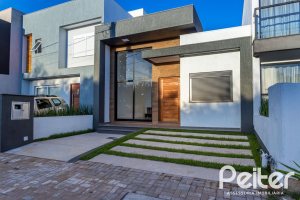 Casa em Condomínio à venda com 98m², 3 dormitórios, 1 suíte, 2 vagas, no bairro Hípica em Porto Alegre
