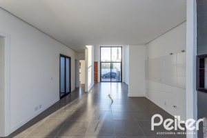 Casa em Condomínio à venda com 98m², 3 dormitórios, 1 suíte, 2 vagas, no bairro Hípica em Porto Alegre