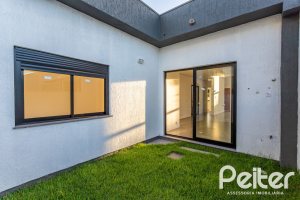 Casa em Condomínio à venda com 98m², 3 dormitórios, 1 suíte, 2 vagas, no bairro Hípica em Porto Alegre