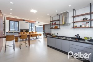 Casa em Condomínio à venda com 270m², 3 dormitórios, 3 suítes, 3 vagas, no bairro Alphaville em PORTO ALEGRE