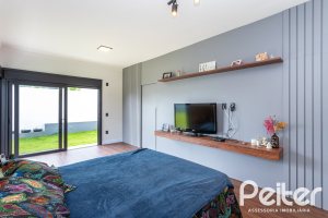 Casa em Condomínio à venda com 270m², 3 dormitórios, 3 suítes, 3 vagas, no bairro Alphaville em PORTO ALEGRE