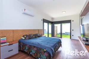 Casa em Condomínio à venda com 270m², 3 dormitórios, 3 suítes, 3 vagas, no bairro Alphaville em PORTO ALEGRE