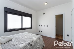 Casa em Condomínio à venda com 270m², 3 dormitórios, 3 suítes, 3 vagas, no bairro Alphaville em PORTO ALEGRE