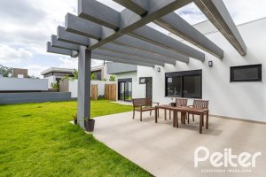 Casa em Condomínio à venda com 270m², 3 dormitórios, 3 suítes, 3 vagas, no bairro Alphaville em PORTO ALEGRE