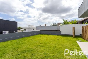 Casa em Condomínio à venda com 270m², 3 dormitórios, 3 suítes, 3 vagas, no bairro Alphaville em PORTO ALEGRE