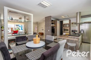 Casa em Condomínio à venda com 245m², 3 dormitórios, 3 suítes, 4 vagas, no bairro Mountain Ville em PORTO ALEGRE