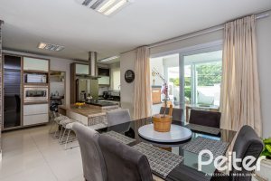 Casa em Condomínio à venda com 245m², 3 dormitórios, 3 suítes, 4 vagas, no bairro Mountain Ville em PORTO ALEGRE