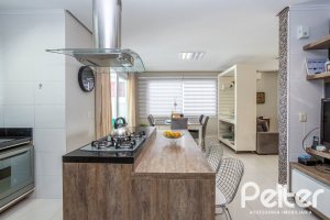 Casa em Condomínio à venda com 245m², 3 dormitórios, 3 suítes, 4 vagas, no bairro Mountain Ville em PORTO ALEGRE