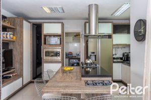 Casa em Condomínio à venda com 245m², 3 dormitórios, 3 suítes, 4 vagas, no bairro Mountain Ville em PORTO ALEGRE