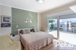 Casa em Condomínio à venda com 245m², 3 dormitórios, 3 suítes, 4 vagas, no bairro Mountain Ville em PORTO ALEGRE