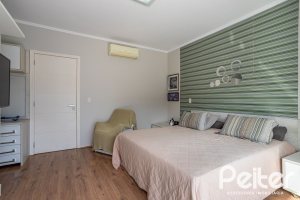 Casa em Condomínio à venda com 245m², 3 dormitórios, 3 suítes, 4 vagas, no bairro Mountain Ville em PORTO ALEGRE