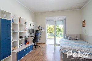 Casa em Condomínio à venda com 245m², 3 dormitórios, 3 suítes, 4 vagas, no bairro Mountain Ville em PORTO ALEGRE