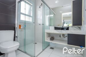 Casa em Condomínio à venda com 245m², 3 dormitórios, 3 suítes, 4 vagas, no bairro Mountain Ville em PORTO ALEGRE