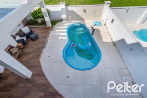 Casa em Condomínio à venda com 245m², 3 dormitórios, 3 suítes, 4 vagas, no bairro Mountain Ville em PORTO ALEGRE