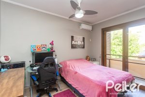 Casa à venda com 370m², 4 dormitórios, 4 suítes, 2 vagas, no bairro Tristeza em Porto Alegre