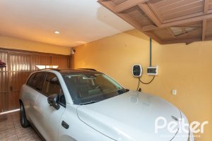 Casa à venda com 370m², 4 dormitórios, 4 suítes, 2 vagas, no bairro Tristeza em Porto Alegre