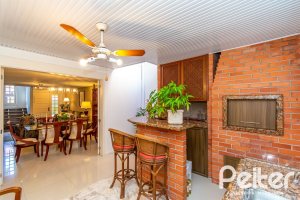 Casa em Condomínio à venda com 160m², 3 dormitórios, 1 suíte, 2 vagas, no bairro Tristeza em PORTO ALEGRE