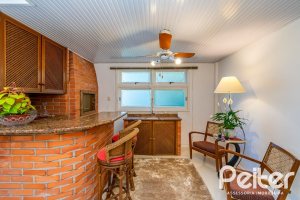 Casa em Condomínio à venda com 160m², 3 dormitórios, 1 suíte, 2 vagas, no bairro Tristeza em PORTO ALEGRE