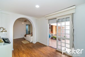 Casa em Condomínio à venda com 160m², 3 dormitórios, 1 suíte, 2 vagas, no bairro Tristeza em PORTO ALEGRE