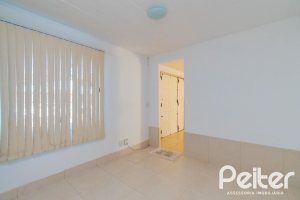 Casa à venda com 180m², 3 dormitórios, 1 suíte, 2 vagas, no bairro Ipanema em Porto Alegre