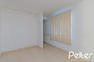 Casa à venda com 180m², 3 dormitórios, 1 suíte, 2 vagas, no bairro Ipanema em Porto Alegre