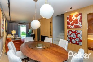 Casa em Condomínio à venda com 240m², 3 dormitórios, 1 suíte, 2 vagas, no bairro Tristeza em Porto Alegre