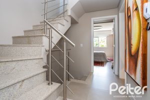 Casa em Condomínio à venda com 240m², 3 dormitórios, 1 suíte, 2 vagas, no bairro Tristeza em Porto Alegre