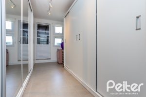 Casa em Condomínio à venda com 240m², 3 dormitórios, 1 suíte, 2 vagas, no bairro Tristeza em Porto Alegre