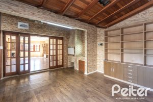 Casa à venda com 155m², 3 dormitórios, 1 suíte, 2 vagas, no bairro Guarujá em Porto Alegre