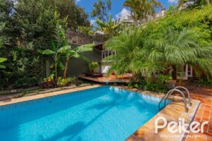 Casa à venda com 326m², 3 dormitórios, 1 suíte, 4 vagas, no bairro Ipanema em Porto Alegre