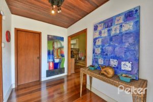 Casa à venda com 326m², 3 dormitórios, 1 suíte, 4 vagas, no bairro Ipanema em Porto Alegre