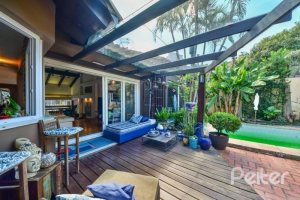 Casa à venda com 326m², 3 dormitórios, 1 suíte, 4 vagas, no bairro Ipanema em Porto Alegre