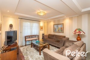 Casa em Condomínio à venda com 176m², 4 dormitórios, 2 suítes, 3 vagas, no bairro Ipanema em Porto Alegre