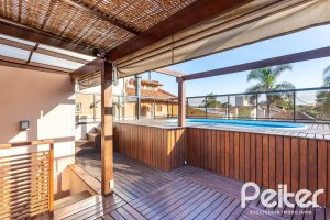 Casa em Condomínio à venda com 176m², 4 dormitórios, 2 suítes, 3 vagas, no bairro Ipanema em Porto Alegre