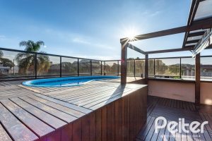 Casa em Condomínio à venda com 176m², 4 dormitórios, 2 suítes, 3 vagas, no bairro Ipanema em Porto Alegre