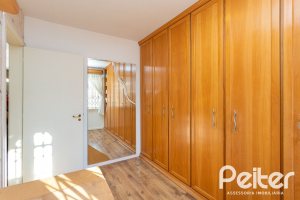 Casa em Condomínio à venda com 176m², 4 dormitórios, 2 suítes, 3 vagas, no bairro Ipanema em Porto Alegre